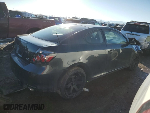 2009 Scion tC with VIN JTKDE167990279631, listed as a Copart auction lot 43079415 with 185,882 mi miles and Salvage Title. Bid and sale history available at carsss.com. Image 3.