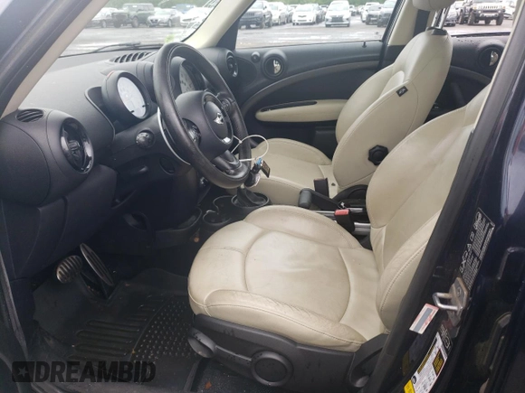 2014 MINI Countryman S с VIN WMWZC5C5XEWP36643, выставлен на аукционе Copart как лот 60142695 с пробегом 116 497 миль миль и Списание • Salvage title. История ставок и продаж доступна на DreamBid. Изображение 7.
