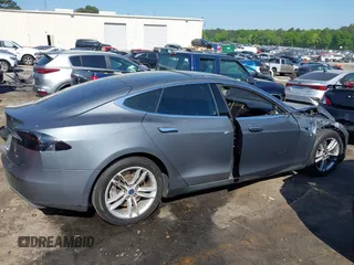 2014 Tesla Model S 60 с VIN 5YJSA1S12EFP41227, выставлен на аукционе IAAI как лот 42027457 с пробегом 81 665 миль миль и . История ставок и продаж доступна на DreamBid. Изображение 13.
