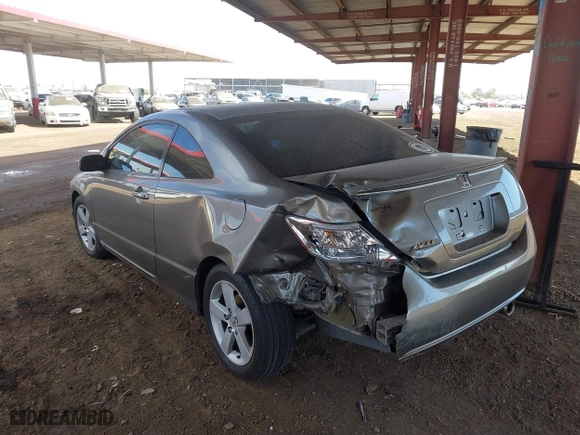 2008 Honda Civic Cpe EX-L with VIN 2HGFG12998H552158, listed as a IAAI auction lot 41636985 with 143,337 mi miles. Bid and sale history available at carsss.com. Image 3.