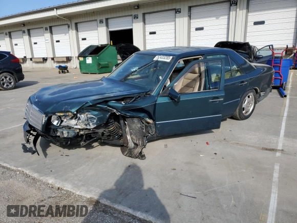 1995 Mercedes-Benz E Class with VIN WDBEA32E1SC242552, listed as a Copart auction lot 52433285 with 211,669 mi miles and Salvage Title. Bid and sale history available at carsss.com. Image 1.