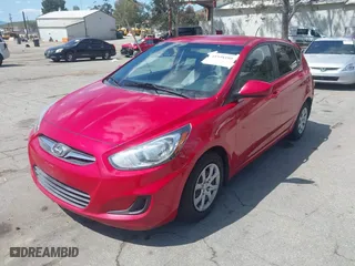 2014 Hyundai Accent GS with VIN KMHCT5AE9EU174866, listed as a IAAI auction lot 41948180 with 117,985 mi miles. Bid and sale history available at carsss.com. Image 2.