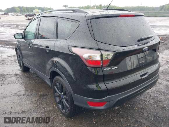 2017 Ford Escape SE with VIN 1FMCU0GD3HUD07141, listed as a IAAI auction lot 42250771 with 116,086 mi miles and . Bid and sale history available at DreamBid. Image 3.