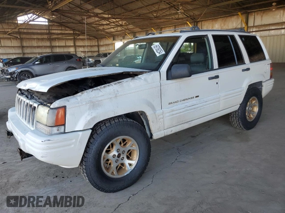 1996 Jeep Grand Cherokee with VIN 1J4EZ78Y9TC104398, listed as a Copart auction lot 69706254 with Not provided miles and Salvage title. Bid and sale history available at DreamBid. Image 1.