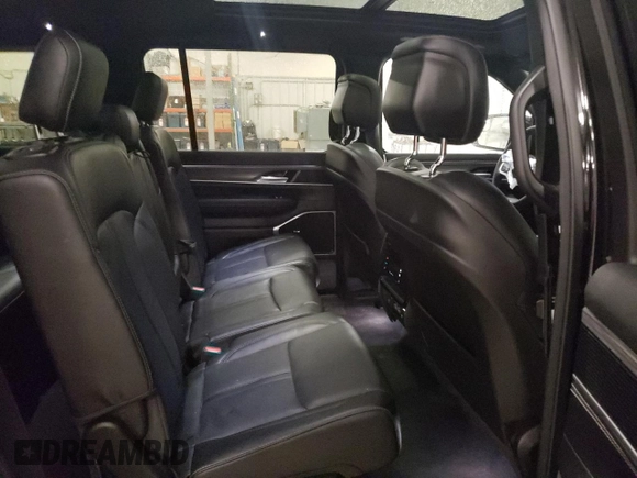 2023 Jeep Wagoneer Series III с VIN 1C4SJSDP0PS503082, выставлен на аукционе Copart как лот 77155824 с пробегом 21 774 миль миль и Списание • Salvage title. История ставок и продаж доступна на DreamBid. Изображение 11.