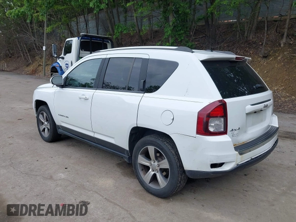 2016 Jeep Compass High Altitude with VIN 1C4NJDEB0GD546305, listed as a IAAI auction lot 42371770 with 158,486 mi miles and . Bid and sale history available at DreamBid. Image 3.
