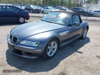 2000 BMW Z3 2.8L with VIN 4USCH3341YLF71039, listed as a IAAI auction lot 42038680 with 157,982 mi miles. Bid and sale history available at carsss.com. Image 2.