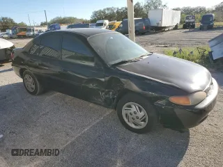 1999 Ford Escort LX with VIN 1FAFP10P5XW277376, listed as a Copart auction lot 82148204 with 127,634 mi miles and Salvage Title. Bid and sale history available at carsss.com. Image 4.