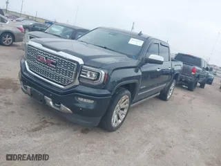 2018 GMC Sierra 1500 Denali with VIN 3GTU2PEJ6JG446091, listed as a IAAI auction lot 41659323 with 109,986 mi miles. Bid and sale history available at carsss.com. Image 2.