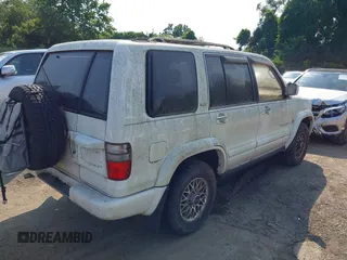 2001 Isuzu Trooper S with VIN JACDJ58X117J00628, listed as a IAAI auction lot 42810469 with 104,474 mi miles and . Bid and sale history available at DreamBid. Image 4.