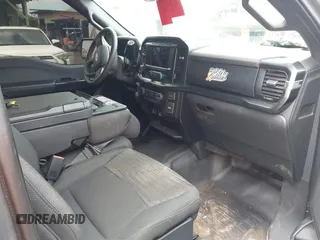 2021 Ford F-150 XL with VIN 1FTEW1EP0MFB94936, listed as a IAAI auction lot 41594393 with 57,033 mi miles. Bid and sale history available at carsss.com. Image 5.