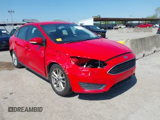 2016 Ford Focus SE with VIN 1FADP3F2XGL205797, listed as a IAAI auction lot 41987209 with 129,042 mi miles. Bid and sale history available at carsss.com. Image 1.