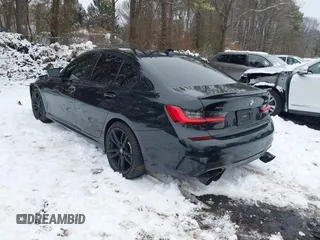 2021 BMW 3 Series M340i xDrive with VIN 3MW5U9J01M8B63472, listed as a IAAI auction lot 41425056 with 63,223 mi miles. Bid and sale history available at carsss.com. Image 3.