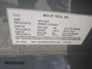 2022 Tesla Model Y Performance with VIN 7SAYGDEF3NF324705, listed as a IAAI auction lot 42076565 with 66,573 mi miles and . Bid and sale history available at carsss.com. Image 9.