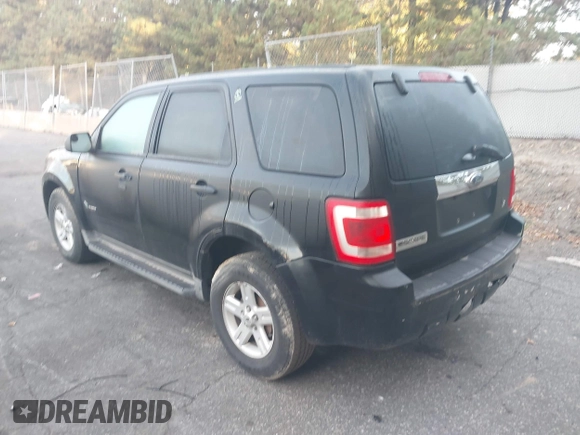2011 Ford Escape Hybrid with VIN 1FMCU4K3XBKB04742, listed as a IAAI auction lot 40557688 with 258,767 mi miles and . Bid and sale history available at DreamBid. Image 3.