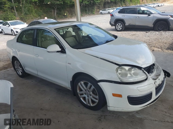2007 Volkswagen Jetta Wolfsburg Edition z VIN 3VWEF71K67M064187, wystawiony jako Copart lot #59381025 z przebiegiem 184 434 mil mil oraz Szkoda całkowita • Salvage title. Historia ofert i sprzedaży dostępna na DreamBid. Obrazek 4.