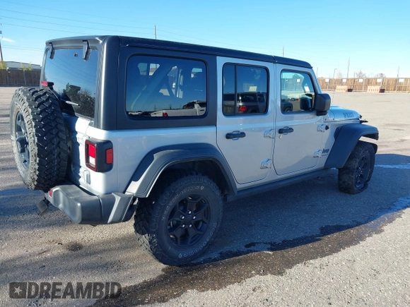 2023 Jeep Wrangler z VIN 1C4JJXN62PW628429, wystawiony jako IAAI lot #40861135 z przebiegiem 33 923 mil mil oraz . Historia ofert i sprzedaży dostępna na DreamBid. Obrazek 4.