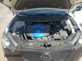 2013 Mazda CX-5 Sport with VIN JM3KE2BE4D0109296, listed as a Copart auction lot 55575555 with 130,112 mi miles and Salvage title. Bid and sale history available at DreamBid. Image 12.