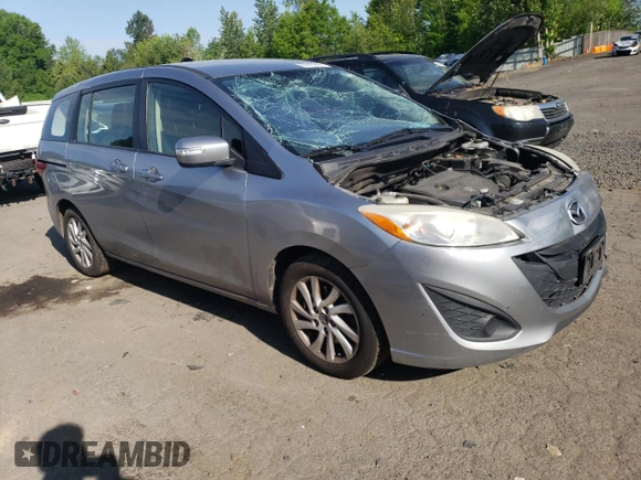 2014 Mazda 5 Sport with VIN JM1CW2BLXE0168024, listed as a Copart auction lot 55010995 with 204,562 mi miles and Salvage title. Bid and sale history available at DreamBid. Image 4.
