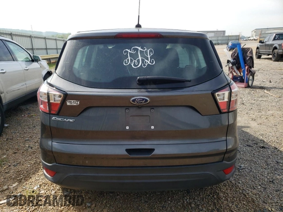 2018 Ford Escape S with VIN 1FMCU0F71JUD02540, listed as a Copart auction lot 54337495 with 102,619 mi miles and Salvage title. Bid and sale history available at DreamBid. Image 6.