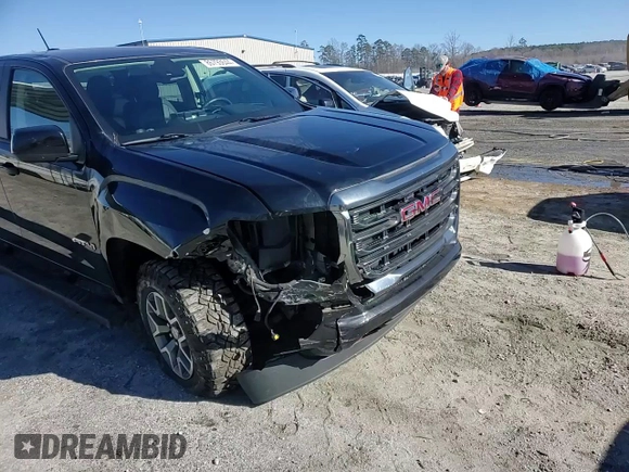 2021 GMC Canyon 4WD AT4 w/Leather with VIN 1GTG6FEN4M1155641, listed as a Copart auction lot 86793644 with 36,940 mi miles and Salvage Title. Bid and sale history available at carsss.com. Image 13.