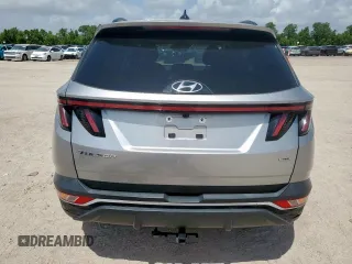 2023 Hyundai Tucson SEL with VIN 5NMJBCAE7PH220482, listed as a Copart auction lot 61783325 with 35,764 mi miles and Salvage title. Bid and sale history available at DreamBid. Image 6.