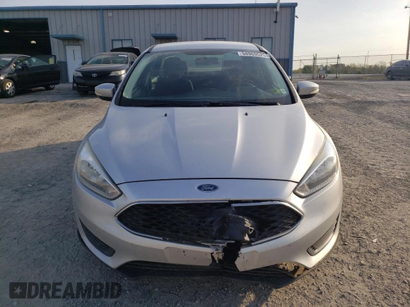 2016 Ford Focus SE с VIN 1FADP3F27GL233668, выставлен на аукционе Copart как лот 54969525 с пробегом 164 581 миль миль и Списание • Salvage title. История ставок и продаж доступна на DreamBid. Изображение 5.