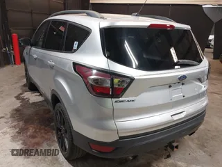 2018 Ford Escape SE z VIN 1FMCU9GD0JUD33111, wystawiony jako IAAI lot #42277404 z przebiegiem 71 896 mil mil oraz . Historia ofert i sprzedaży dostępna na DreamBid. Obrazek 3.