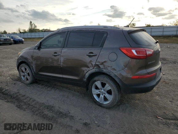2013 Kia Sportage LX z VIN KNDPB3A23D7465413, wystawiony jako Copart lot #83694894 z przebiegiem 122 467 mil mil oraz Szkoda całkowita • Salvage title. Historia ofert i sprzedaży dostępna na DreamBid. Obrazek 2.