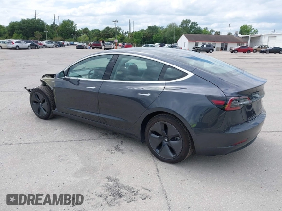 2018 Tesla Model 3 Long Range Battery with VIN 5YJ3E1EB3JF119498, listed as a IAAI auction lot 41966643 with 45,566 mi miles and . Bid and sale history available at DreamBid. Image 3.