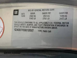 2009 Cadillac DTS 1SA z VIN 1G6KD57Y69U126507, wystawiony jako Copart lot #48392775 z przebiegiem 152 637 mil mil oraz Szkoda całkowita • Salvage title. Historia ofert i sprzedaży dostępna na DreamBid. Obrazek 12.