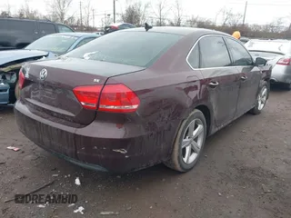 2013 Volkswagen Passat SE w/Sunroof & Nav with VIN 1VWBP7A37DC075527, listed as a IAAI auction lot 41055338 with 151,177 mi miles. Bid and sale history available at carsss.com. Image 4.