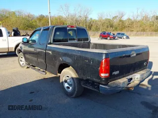 2002 Ford F-150 XL with VIN 2FTRX17282CA94608, listed as a IAAI auction lot 41215380 with 1 mi miles. Bid and sale history available at carsss.com. Image 3.