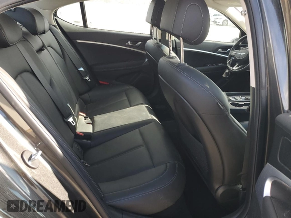 2023 Genesis G70 2.0T with VIN KMTG34TA4PU129199, listed as a Copart auction lot 80963124 with 15,729 mi miles and Salvage Title. Bid and sale history available at carsss.com. Image 10.
