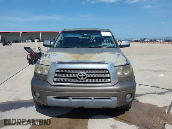 2007 Toyota Tundra Limited z VIN 5TBEV58147S460599, wystawiony jako IAAI lot #42476925 z przebiegiem Nie podano mil oraz . Historia ofert i sprzedaży dostępna na DreamBid. Obrazek 11.