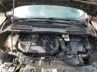 2016 Ford Escape SE z VIN 1FMCU0G99GUA13835, wystawiony jako Copart lot #52401865 z przebiegiem 130 143 mil mil oraz Szkoda całkowita • Salvage title. Historia ofert i sprzedaży dostępna na DreamBid. Obrazek 12.