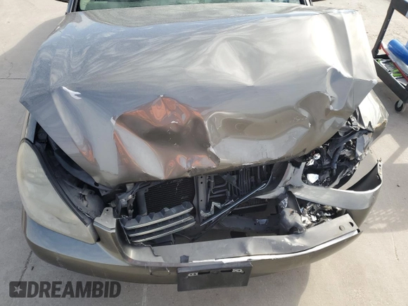 2004 Infiniti Q45 z VIN JNKBF01AX4M500632, wystawiony jako Copart lot #87741405 z przebiegiem 188 505 mil mil oraz Szkoda całkowita • Salvage title. Historia ofert i sprzedaży dostępna na DreamBid. Obrazek 11.