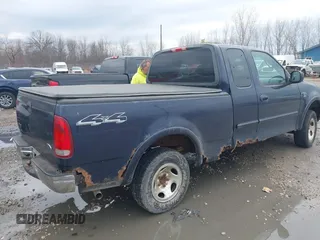 2003 Ford F-150 XL with VIN 1FTRX18W23NB34680, listed as a IAAI auction lot 42089079 with 1 mi miles. Bid and sale history available at carsss.com. Image 4.