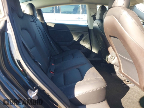2021 Tesla Model 3 Performance with VIN 5YJ3E1EC6MF999321, listed as a IAAI auction lot 41417451 with 20,562 mi miles and . Bid and sale history available at carsss.com. Image 8.