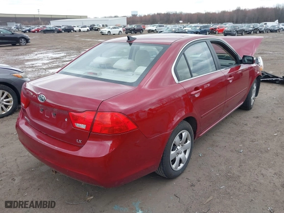 2009 Kia Optima LX with VIN KNAGE228295292892, listed as a IAAI auction lot 41812221 with 179,276 mi miles. Bid and sale history available at carsss.com. Image 4.