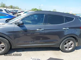 2017 Hyundai Santa Fe 2.4L z VIN 5XYZU3LB4HG462058, wystawiony jako IAAI lot #41861190 z przebiegiem 87 102 mil mil oraz . Historia ofert i sprzedaży dostępna na DreamBid. Obrazek 14.