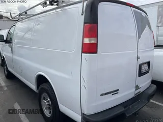 2012 Chevrolet Express Cargo Van with VIN 1GCWGFCA2C1172493, listed as a IAAI auction lot 42186572 with 157,339 mi miles. Bid and sale history available at carsss.com. Image 1.