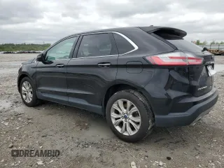2022 Ford Edge Titanium with VIN 2FMPK4K94NBA30860, listed as a Copart auction lot 54001865 with 94,559 mi miles and Salvage title. Bid and sale history available at DreamBid. Image 2.