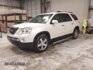 2011 GMC Acadia SLT1 with VIN 1GKKRRED7BJ265501, listed as a IAAI auction lot 41561336 with 152,916 mi miles and . Bid and sale history available at carsss.com. Image 2.