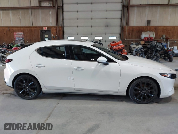2021 Mazda 3 Premium with VIN JM1BPBML6M1348258, listed as a IAAI auction lot 42752477 with 35,285 mi miles and . Bid and sale history available at DreamBid. Image 13.