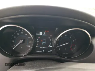2020 Jaguar F-Pace 25t Premium z VIN SADCJ2FX2LA622614, wystawiony jako Copart lot #61855884 z przebiegiem 116 046 mil mil oraz Szkody całkowita. Historia ofert i sprzedaży dostępna na DreamBid. Obrazek 9.