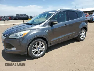 2015 Ford Escape Titanium z VIN 1FMCU9J91FUB72585, wystawiony jako Copart lot #58250065 z przebiegiem 120 869 mil mil oraz Szkoda całkowita • Salvage title. Historia ofert i sprzedaży dostępna na DreamBid. Obrazek 1.