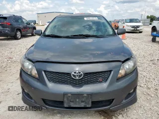 2010 Toyota Corolla z VIN 2T1BU4EE2AC497519, wystawiony jako Copart lot #64614915 z przebiegiem 183 890 mil mil oraz Szkoda całkowita • Salvage title. Historia ofert i sprzedaży dostępna na DreamBid. Obrazek 5.