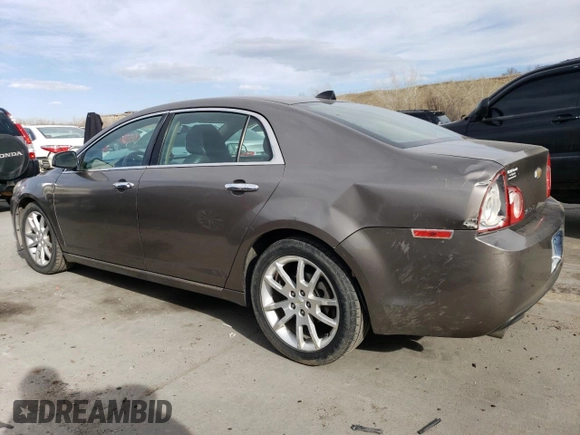 2012 Chevrolet Malibu LTZ with VIN 1G1ZG5E79CF280906, listed as a Copart auction lot 48709325 with 111,704 mi miles and Salvage Title. Bid and sale history available at DreamBid. Image 2.