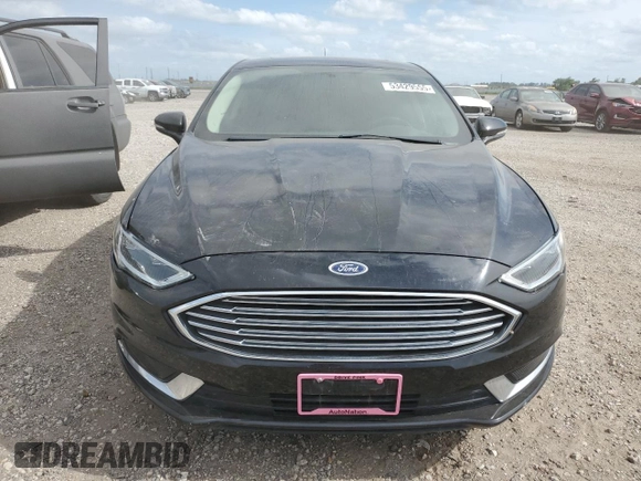 2018 Ford Fusion SE z VIN 3FA6P0HD8JR217719, wystawiony jako Copart lot #53429555 z przebiegiem 108 953 mil mil oraz Szkoda całkowita • Salvage title. Historia ofert i sprzedaży dostępna na DreamBid. Obrazek 5.